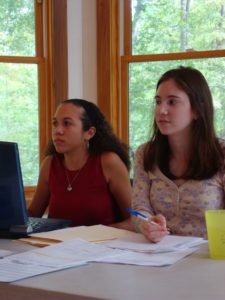 Zoe Woodbridge, right, chairing School Meeting.
