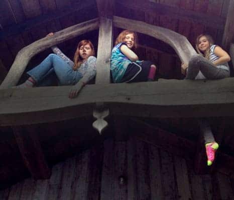 girls-sitting-on-beams