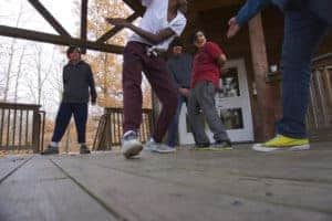 Fairhaven students playing “ninja” on the porch.