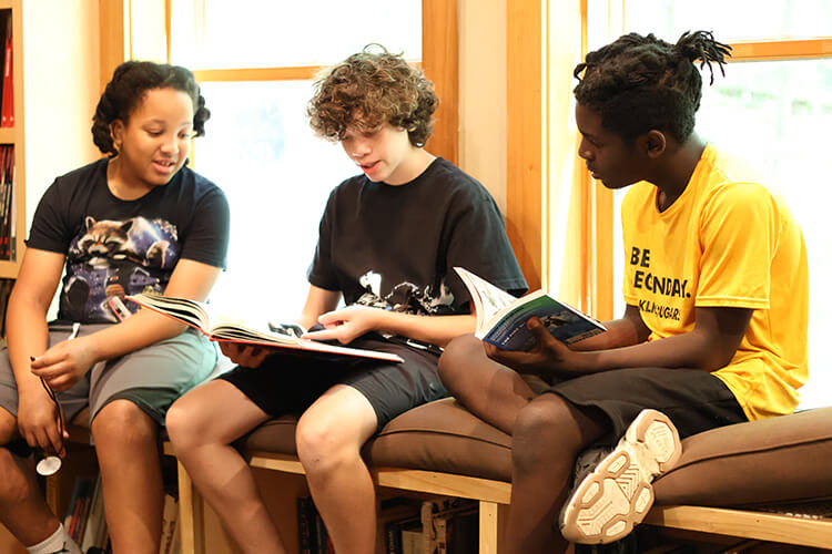 students reading together