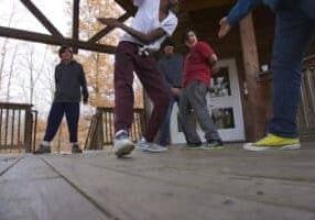 Fairhaven students playing “ninja” on the porch.